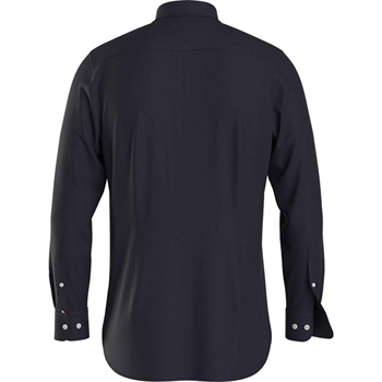 Lækker blød mørkeblå oxford skjorte med button-down fra Tommy Hilfiger.