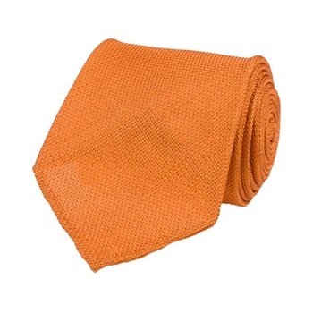Stilfuldt silke slips i orange fra Portia.