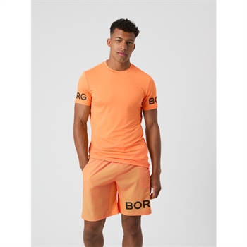 Moderne sports t-shirt i orange fra Björn Borg med logo på ærmerne