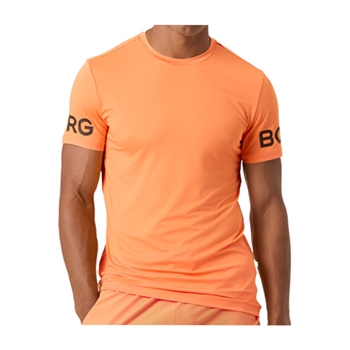 Moderne sports t-shirt i orange fra Björn Borg med logo på ærmerne