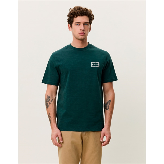 Stilren t-shirt i mørkegrøn med logo fra Les Deux