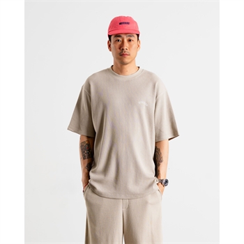 Moderne struktureret t-shirt i beige med logo på bryst og på ryggen fra Woodbird