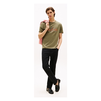 Flot grøn t-shirt med orange print på brystet fra Tommy Hilfiger
