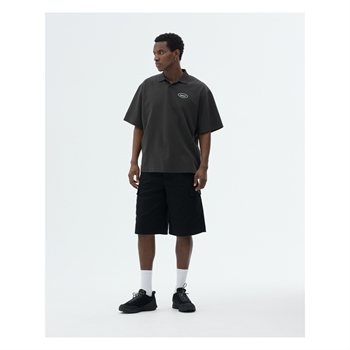 Sort bowler polo med logo på brystet fra Bareen