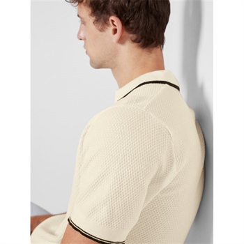 Lækker strikket polo i beige fra Selected.