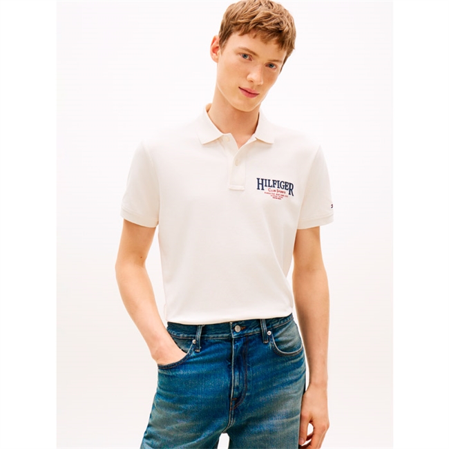Moderne polo i beige med logo detalje fra Tommy Hilfiger