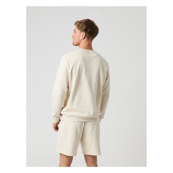 Smart sandfarvet sweatshirt fra Björn Borg med logo