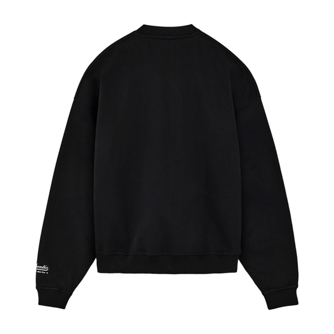Stilren oversized sweatshirt i sort med print på brystet fra Bareen