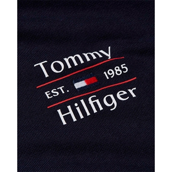 Flot mørkeblå sweatshirt med lynlås og hætte fra Tommy Hilfiger.