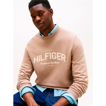 Moderne og komfortabel beige sweatshirt fra Tommy Hilfiger med tryk