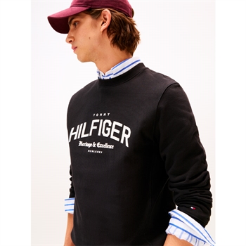 Moderne og komfortabel sort sweatshirt fra Tommy Hilfiger med tryk