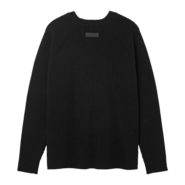 Stilren oversized strik med raglan ærmer i sort fra Bareen
