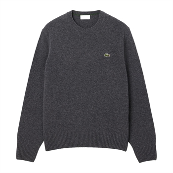 Pæn og enkel grå strik med logo fra Lacoste