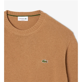 Pæn og enkel brun strik med logo fra Lacoste