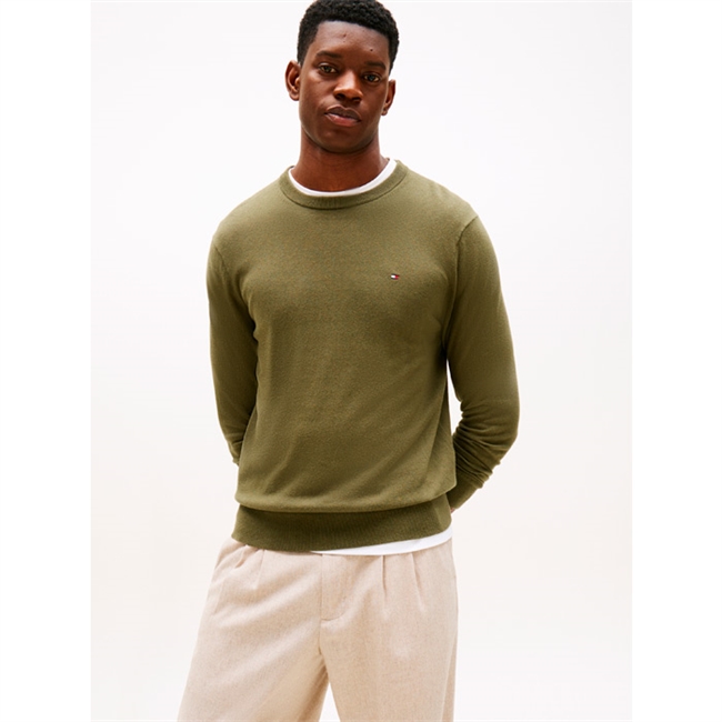 Lækker mørkegrøn crew neck strik i materialet casmereuld og bomuld fra Tommy Hilfiger
