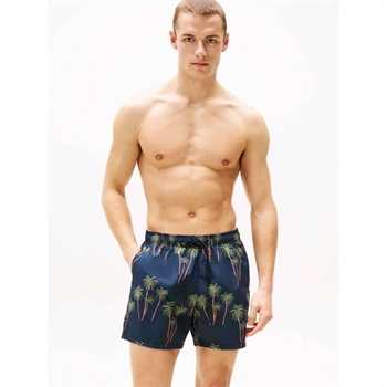 Lækre badeshorts i blå med palmer fra Tommy Hilfiger