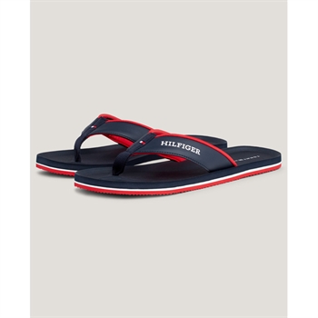 Ikonisk klip klapper i Tommy Hilfiger\'s farver.