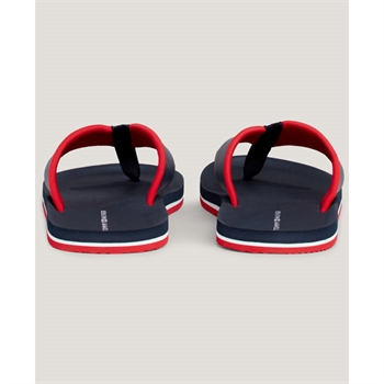 Ikonisk klip klapper i Tommy Hilfiger\'s farver.