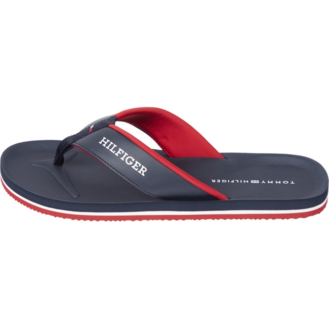 Ikonisk klip klapper i Tommy Hilfiger\'s farver.