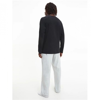 Calvin Klein pyjamassen med Sort langærmet trøje og lys grå bukser